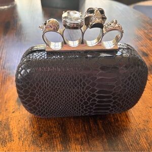 VENUS Black Textured Clutch with Silver Ring Accents